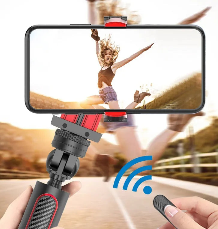 Black aluminium iPhone tripod with integrated video stabilizer extended to full height with phone attached