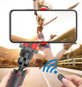 Black aluminium iPhone tripod with integrated video stabilizer extended to full height with phone attached
