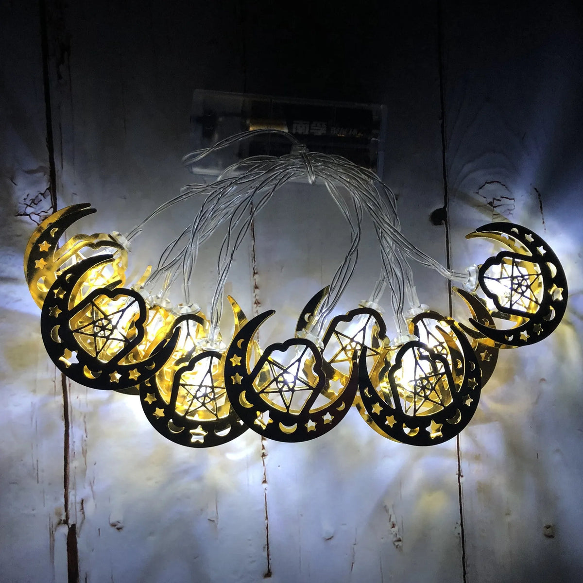 Gold wrought iron moon and star LED string lights for indoor Ramadan and Eid decoration, battery operated