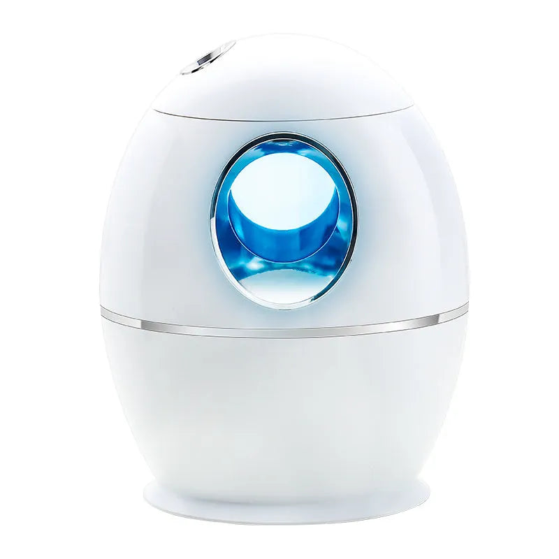 Small round white aromatherapy humidifier with USB cable and water mist emission