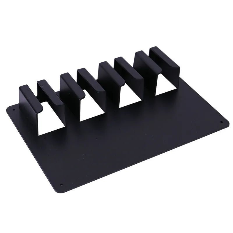 Black plastic wall-mounted frame holding four hair clippers and a hair dryer for salon storage.