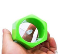 Yellow and green food-grade ABS plastic spiral vegetable cutter on a kitchen counter