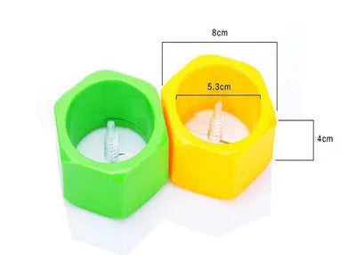Yellow and green food-grade ABS plastic spiral vegetable cutter on a kitchen counter