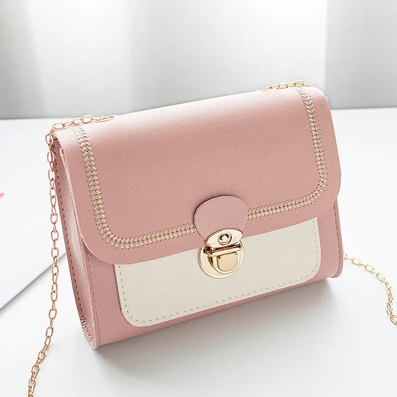 Small horizontal square PU chain shoulder bag with lock closure in yellow colour