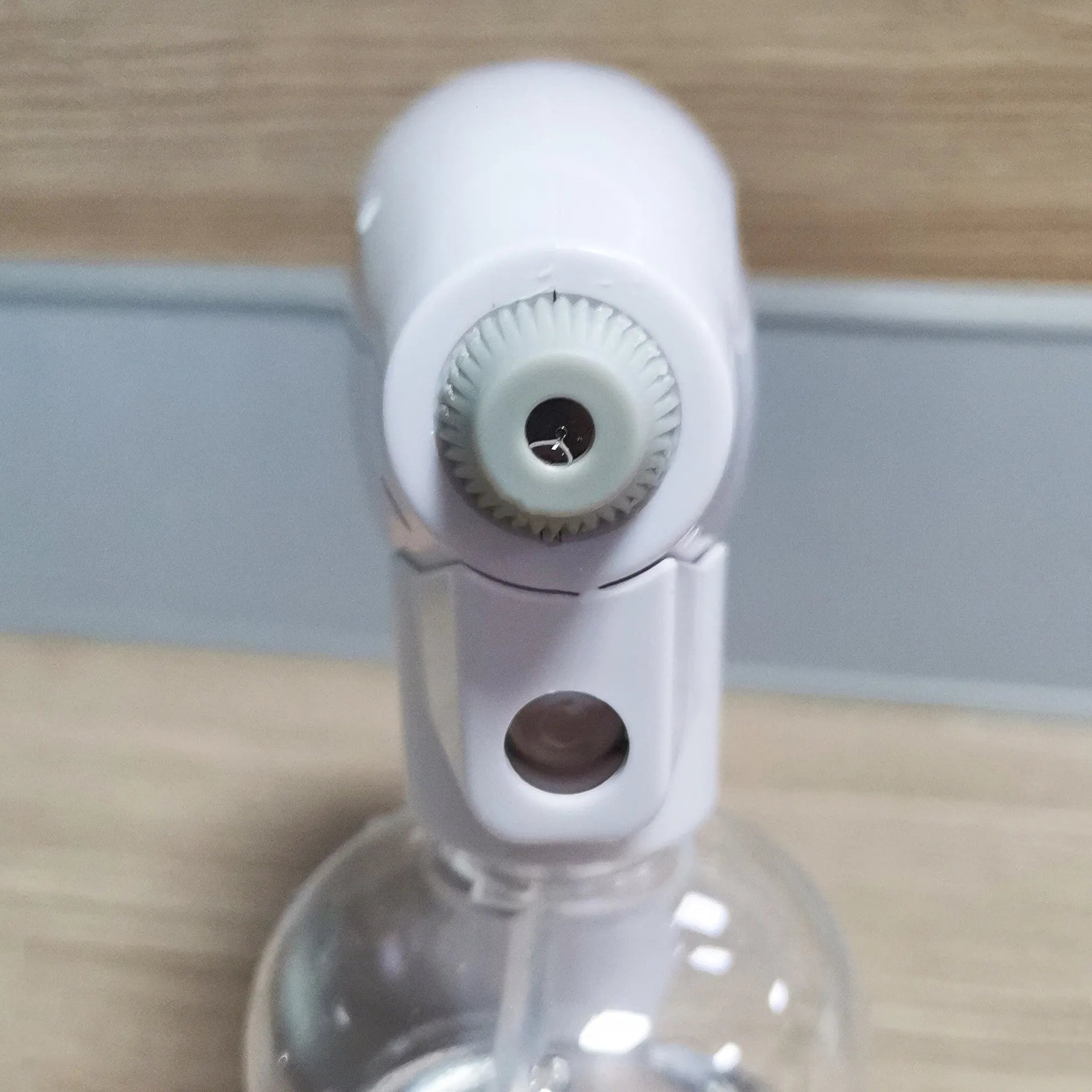 White handheld wireless electric spray disinfection gun with USB cable