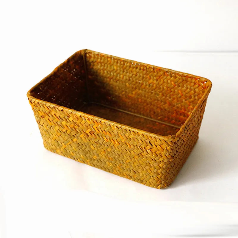 Straw desk storage box in brown colour showing rectangular shape and woven texture