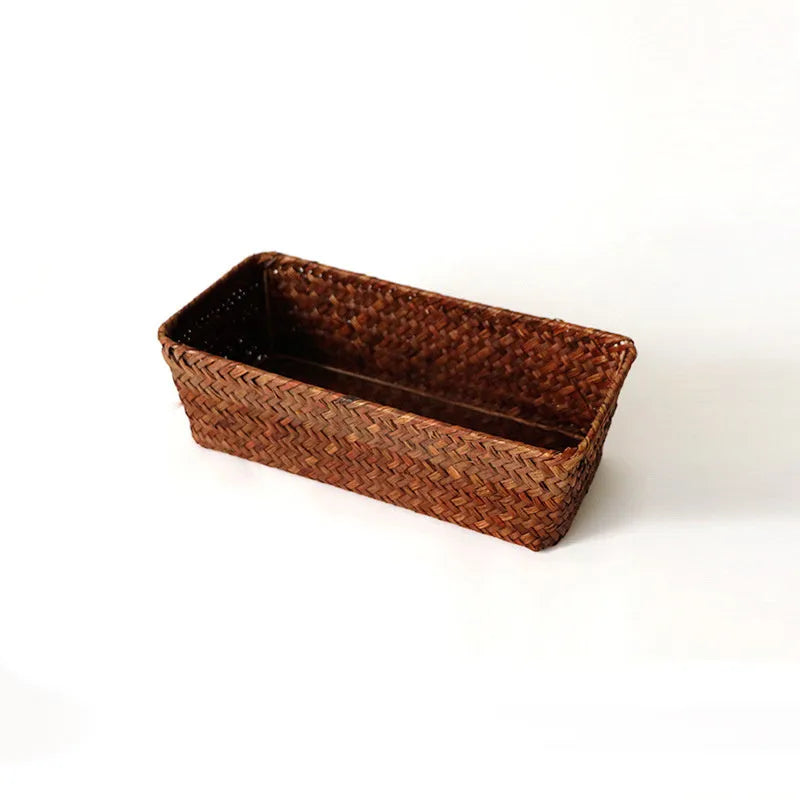 Straw desk storage box in brown colour showing rectangular shape and woven texture