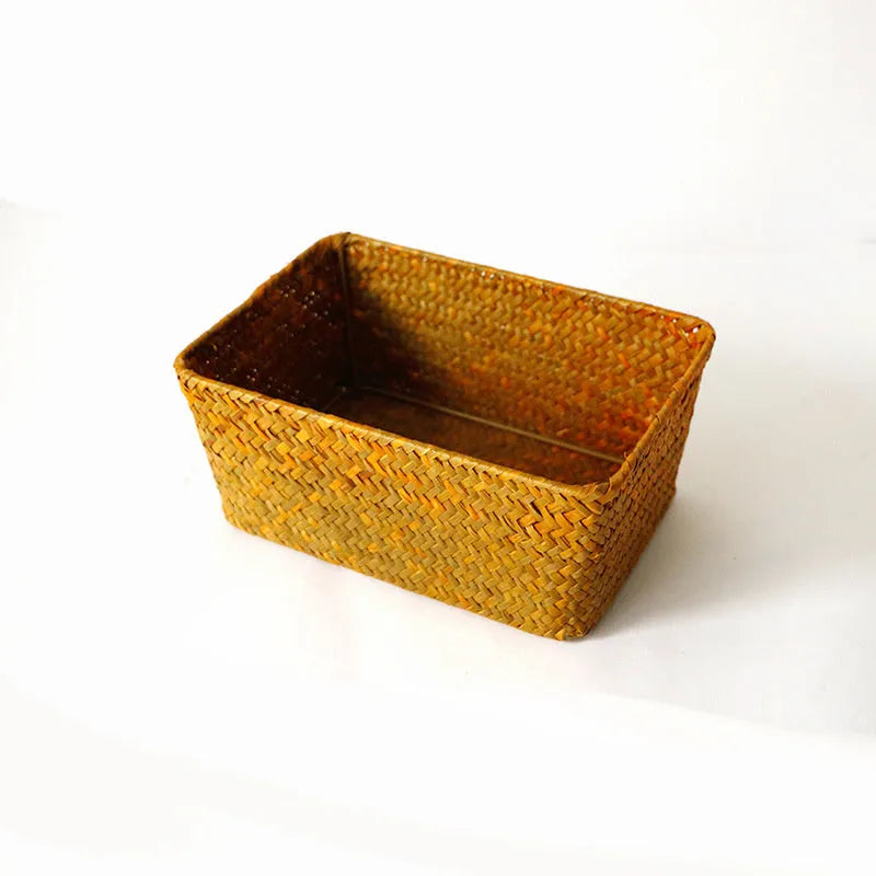 Straw desk storage box in brown colour showing rectangular shape and woven texture