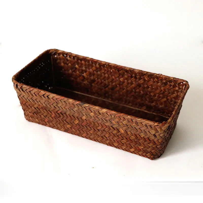 Straw desk storage box in brown colour showing rectangular shape and woven texture