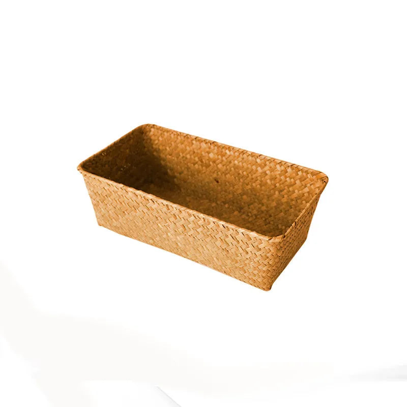 Straw desk storage box in brown colour showing rectangular shape and woven texture