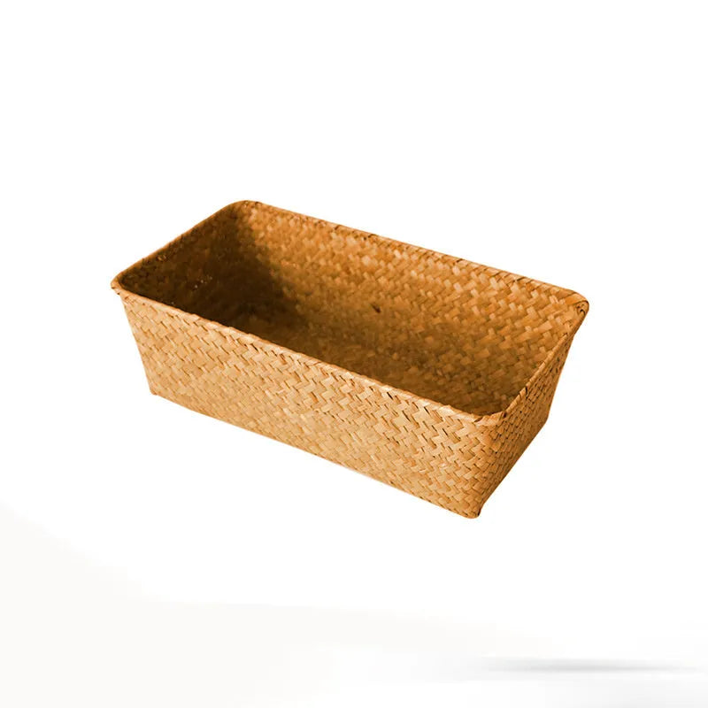 Straw desk storage box in brown colour showing rectangular shape and woven texture