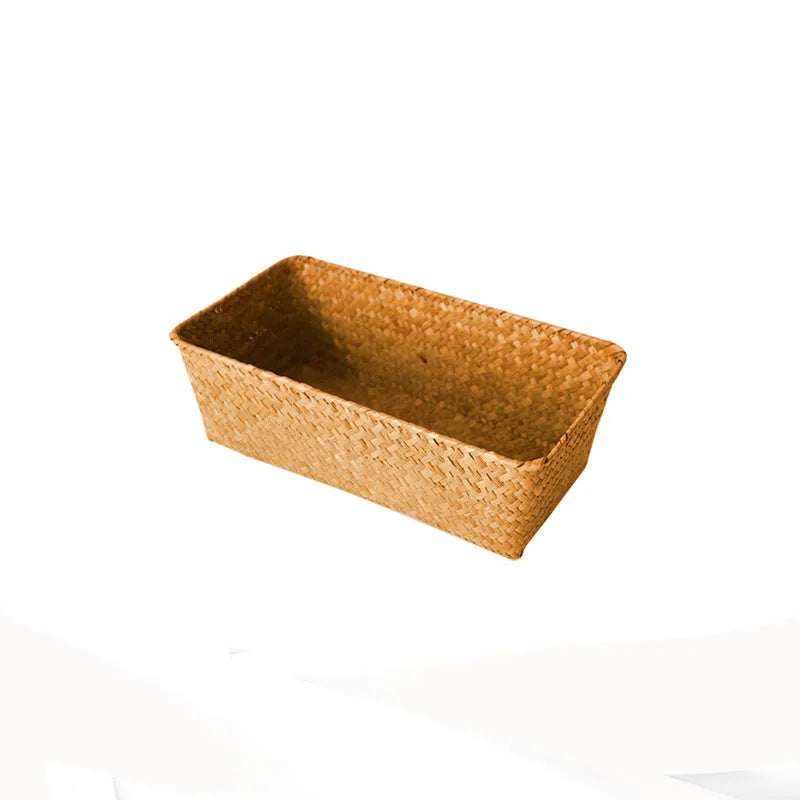 Straw desk storage box in brown colour showing rectangular shape and woven texture