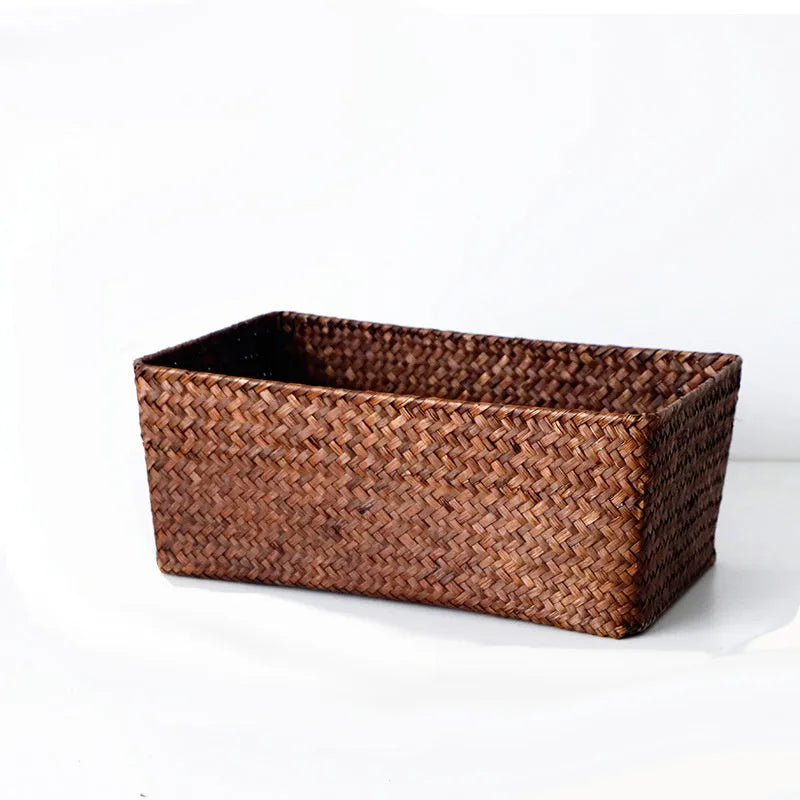 Straw desk storage box in brown colour showing rectangular shape and woven texture