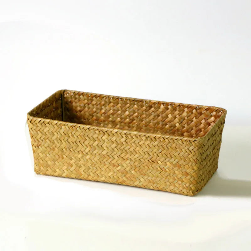 Straw desk storage box in brown colour showing rectangular shape and woven texture