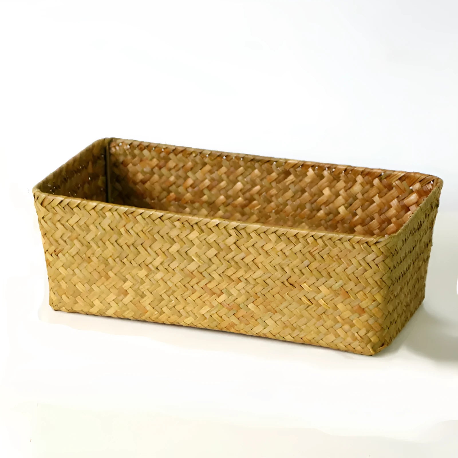 Straw desk storage box in brown colour showing rectangular shape and woven texture