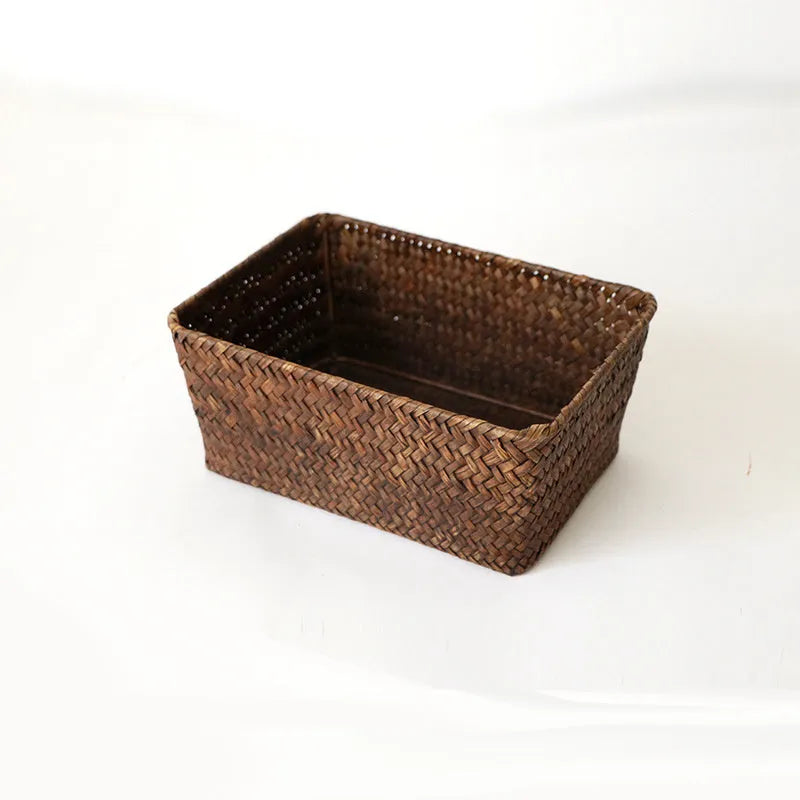 Straw desk storage box in brown colour showing rectangular shape and woven texture