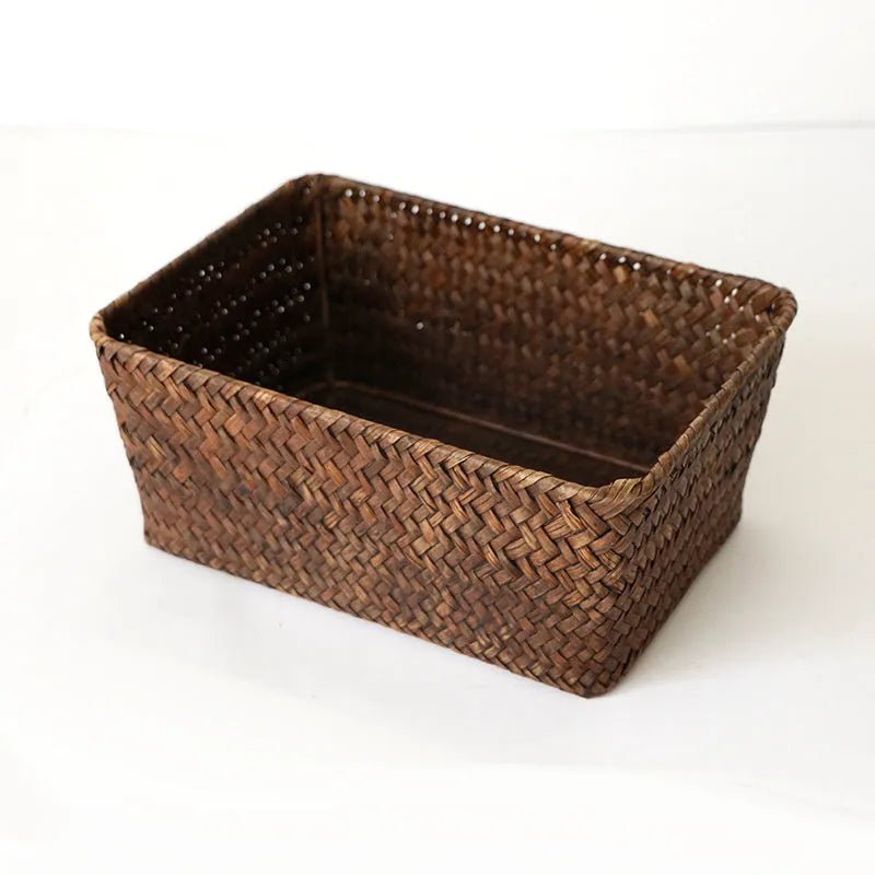 Straw desk storage box in brown colour showing rectangular shape and woven texture