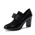 Black patent leather women's high heels with a thick 8cm heel and square toe.