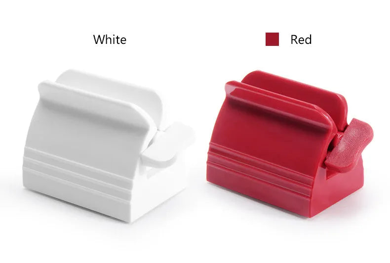 Large white ABS plastic toothpaste squeezer with red accents, used to squeeze toothpaste tubes flat