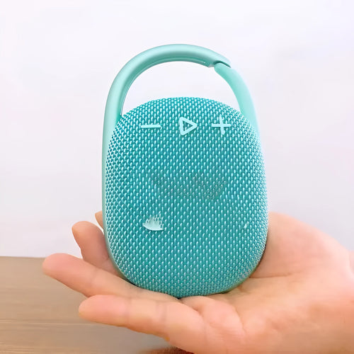 Small portable Bluetooth speaker in choice of colours: pink, blue, black, red, silver grey, green.