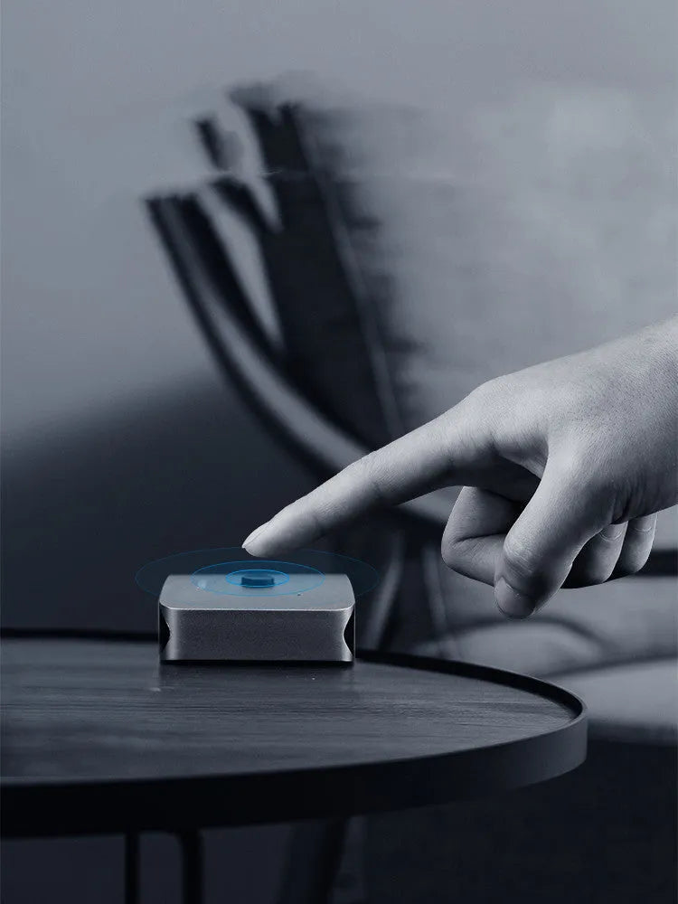 Grey HDMI switcher with two input ports and one output port for sharing displays between devices