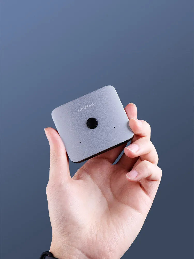 Grey HDMI switcher with two input ports and one output port for sharing displays between devices