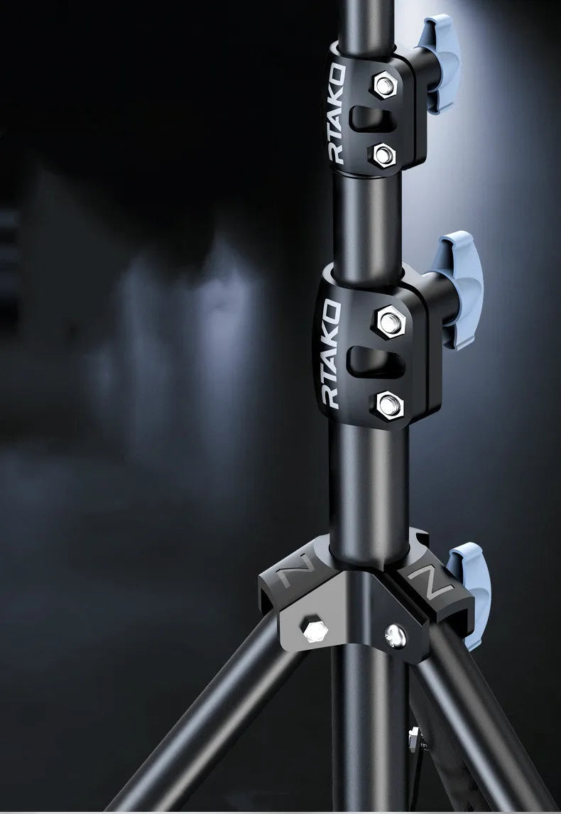 Carbon alloy mobile phone live tripod with a ring light attached, shown with a storage bag.