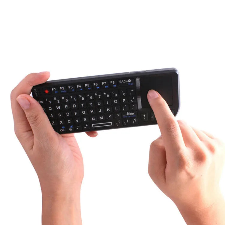 Mini wireless Bluetooth laser touch keyboard Flying Squirrel black with 7 colour backlit keys and laser pointer