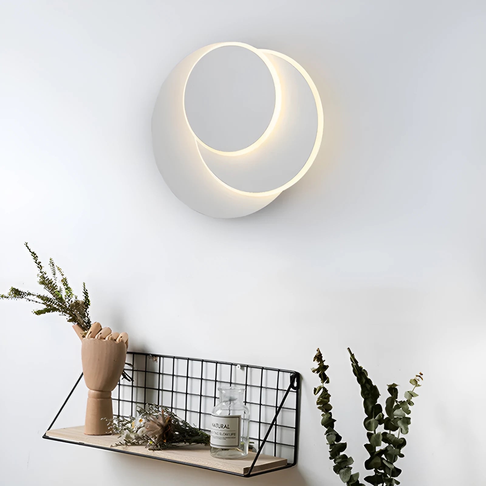 Modern round LED wall lamp in black or white with push button switch