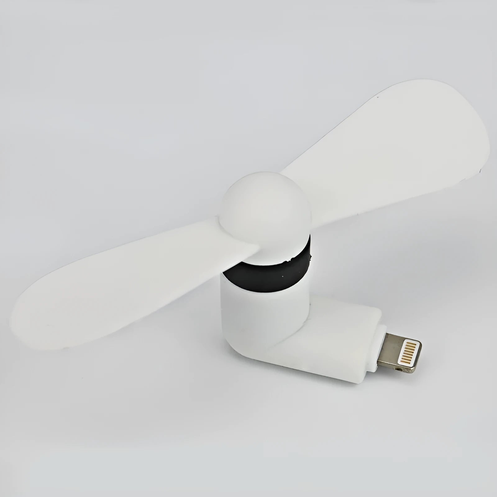 Portable mobile phone mini fan with plastic blades and rotary switch in multiple colours.