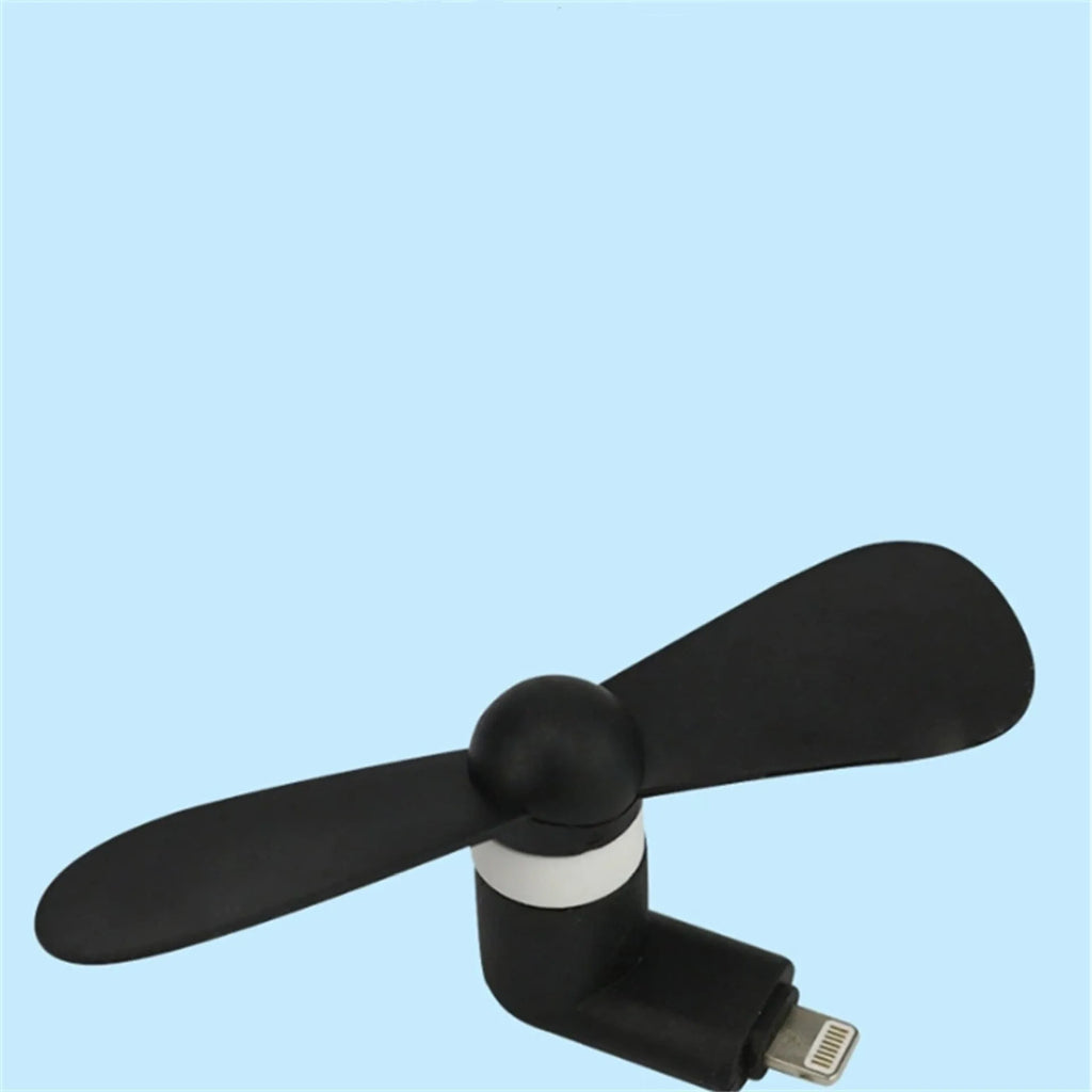 Portable mobile phone mini fan with plastic blades and rotary switch in multiple colours.