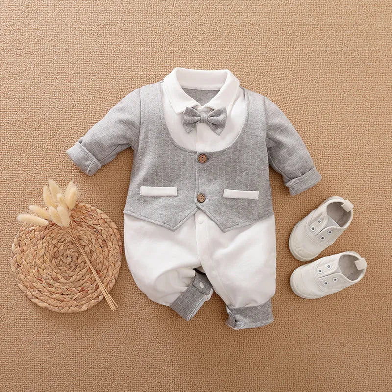 Navy blue cotton baby jumpsuit with collar and long sleeves for spring and autumn wear.