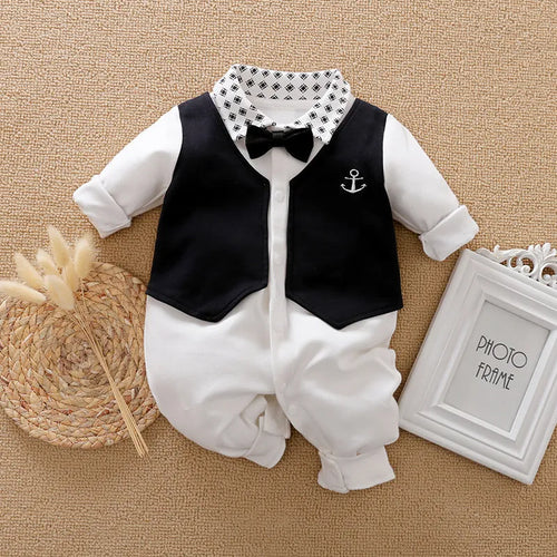 Navy blue cotton baby jumpsuit with collar and long sleeves for spring and autumn wear.