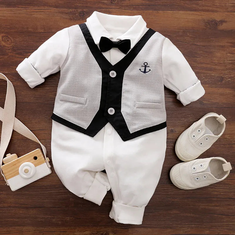 Navy blue cotton baby jumpsuit with collar and long sleeves for spring and autumn wear.