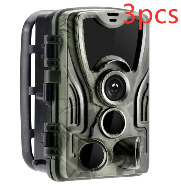 Green cellular trail camera with display screen and infrared sensors for outdoor wildlife monitoring