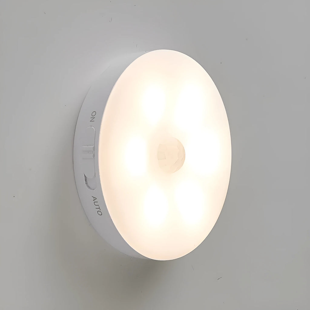 Two wireless motion sensor LED lights for installation inside cabinets or hallways.