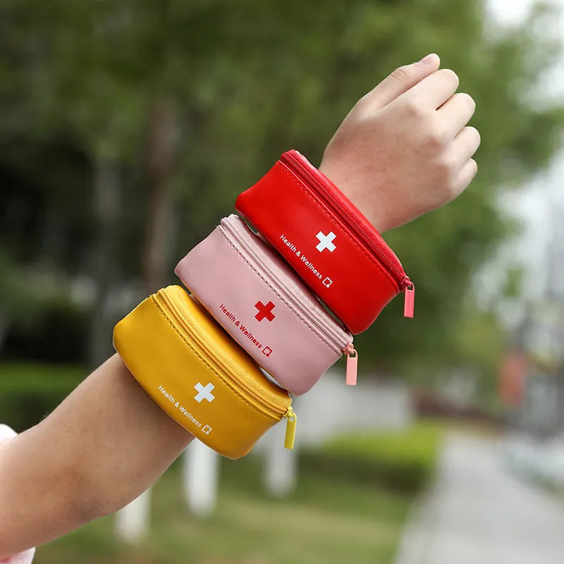 Outdoor mini portable TPU medical bag with printed letter pattern, medium oval shape, zipper closure, in multiple colours.