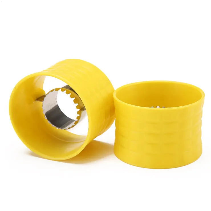 Yellow manual corn thresher kitchen tool with corn-shaped design for removing kernels.