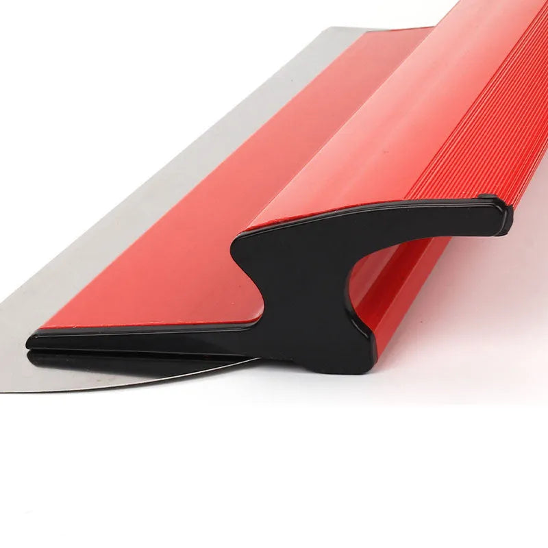Red metal leveling scraper tool with a 40cm long blade for wall putty and wallpaper paste.