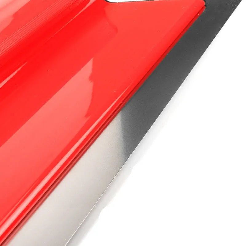 Red metal leveling scraper tool with a 40cm long blade for wall putty and wallpaper paste.