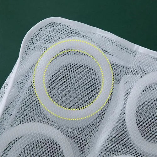 Shoe washing bag in blue mesh with foam padding, hidden zipper, and side lanyards for machine washing
