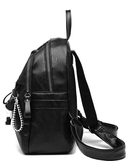 Soft black pu leather backpack with double shoulder straps and a luggage strap attachment