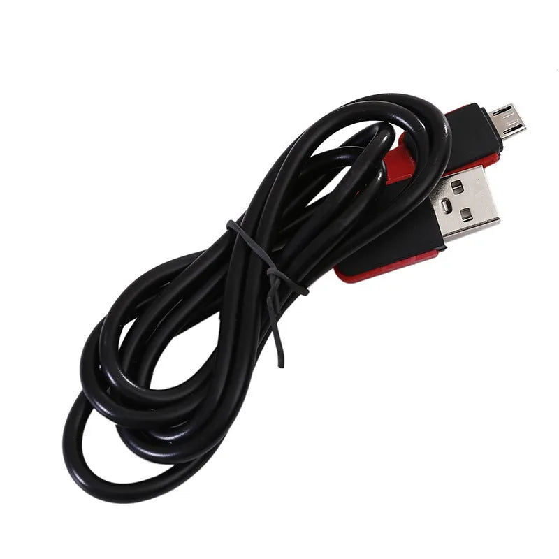 Red portable COB LED flashlight with a magnetic hook on a metal surface.