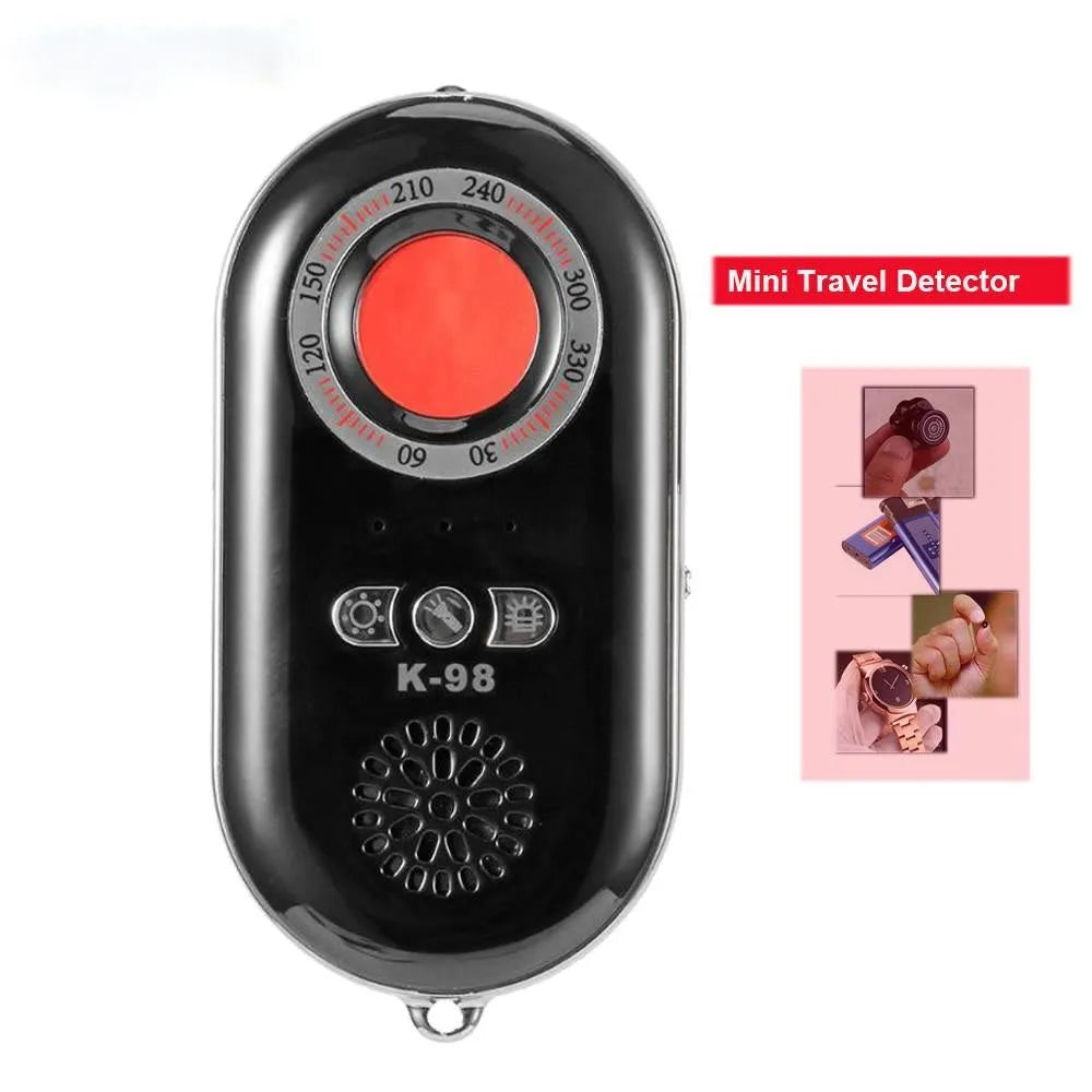 Small black rectangular wireless signal detector and vibration alarm unit on a white background.