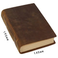 Handmade leather notebook with brown Crazy Horse cover, 200 pages, 19x14cm, open on a desk