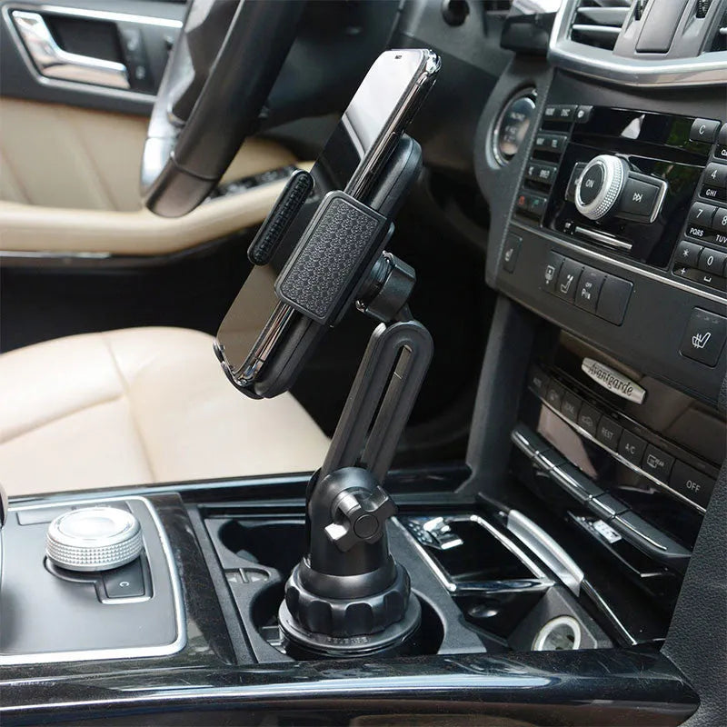 Black ABS car phone holder with 360-degree rotating head and adjustable height on a car air vent.