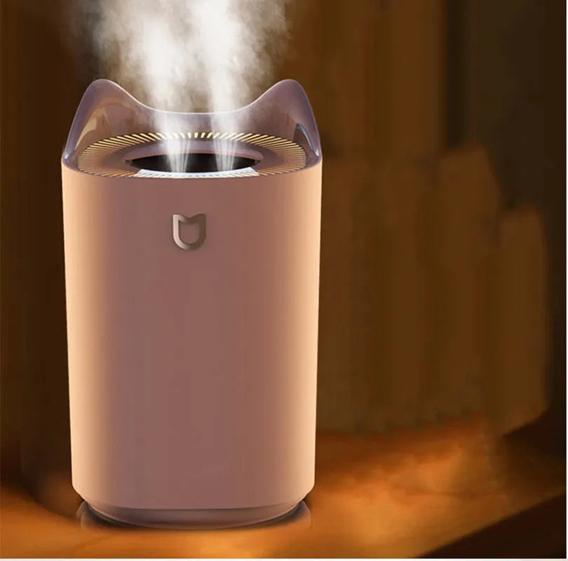 Coral Pink and Glacier White double spray USB humidifier and aroma diffuser with large water tank.