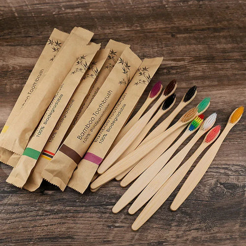 Set of 10 colourful bamboo toothbrushes with charcoal bristles for sustainable dental care