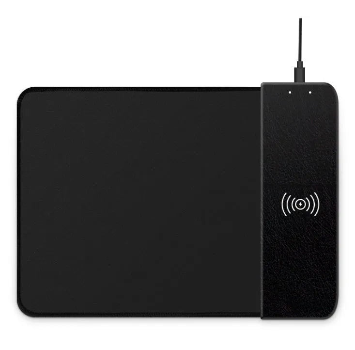 Black wireless charging mouse pad with cartoon design, showing RGB lighting and USB cable.