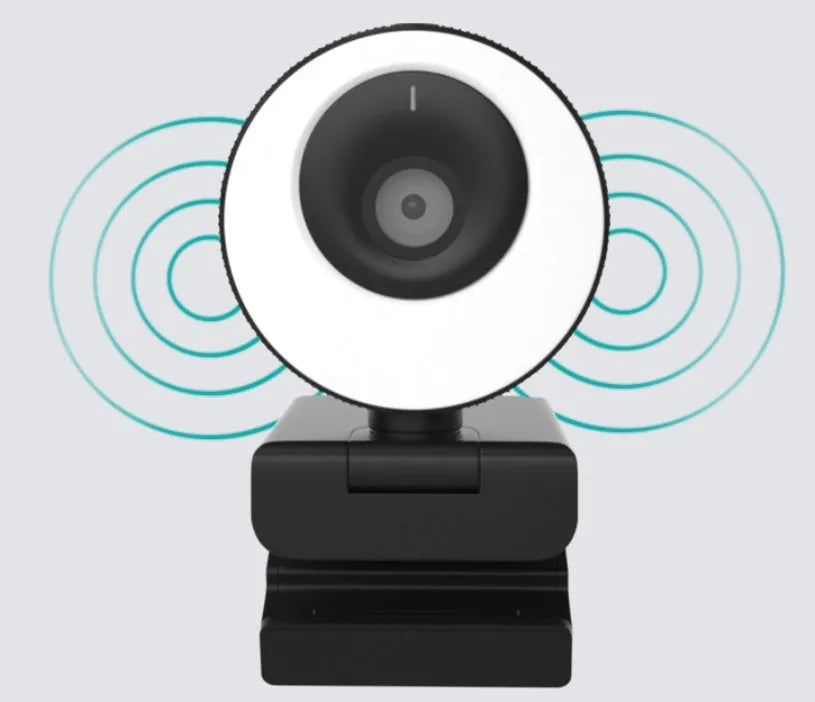 Black USB webcam with magnetic privacy cover on computer monitor